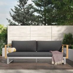 OUTLIV. Hawaii Gartensofa Edelstahl/Teak/Polster Dunkelgrau